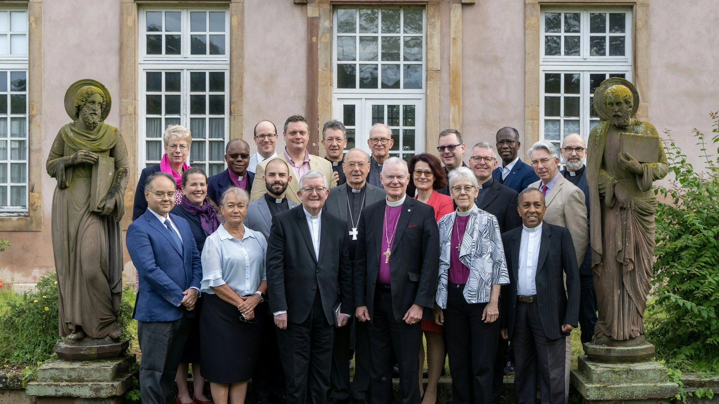 Members of the official Anglican–Roman Catholic International Commission pose for a photo during their meeting May 11-18, 2024, in Strasbourg, France. Archbishop Bernard Longley of Birmingham, England, center left, is the Catholic co-chair of the commission, and Archbishop Philip Freier of Melbourne, Australia, center right, is the Anglican co-chair
